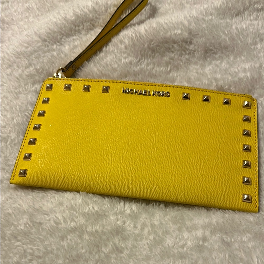 Yellow Michael Kors clutch. NEVER USED